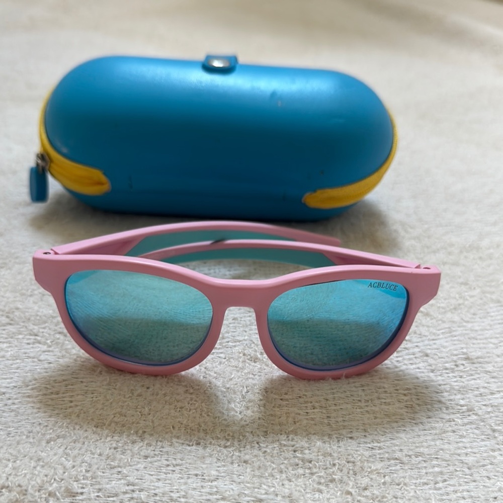 ACBLUZE kids Pink Polarized Sunglasses with Blue Lenses, fun and great quality.